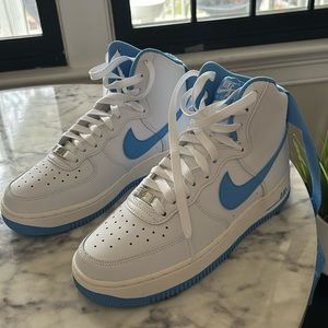 Brand new Nike air force, one high top sneakers, never worn.